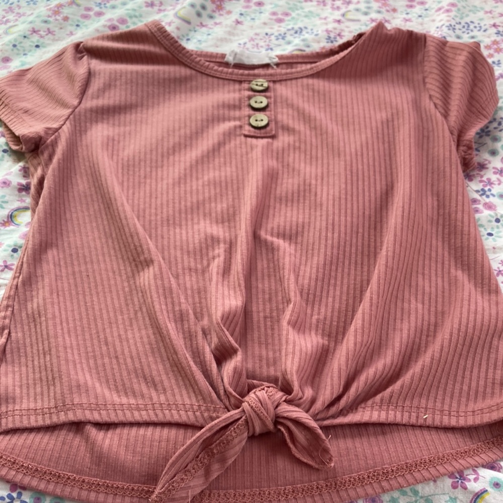 Dark pink shirt, with three buttons that do not on button size 10